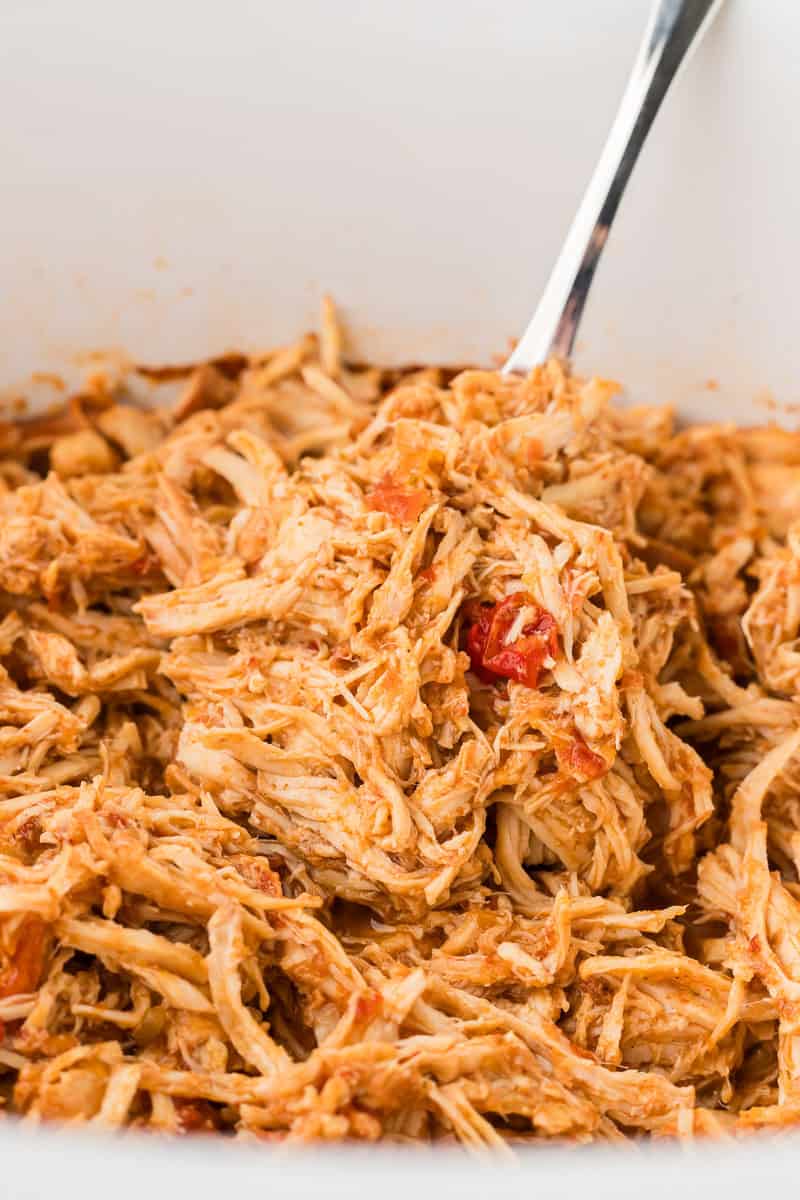 salsa chicken being served from a crock pot